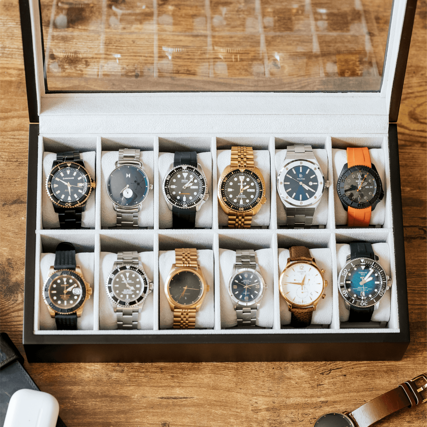 Caja para relojes de madera maciza - 12 ranuras