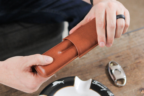 Klaro Travel Leather Cigar Case, 5 Cigar Storage, 2 Accessory Pockets,  Humidification Pocket, Intern…See more Klaro Travel Leather Cigar Case, 5  Cigar